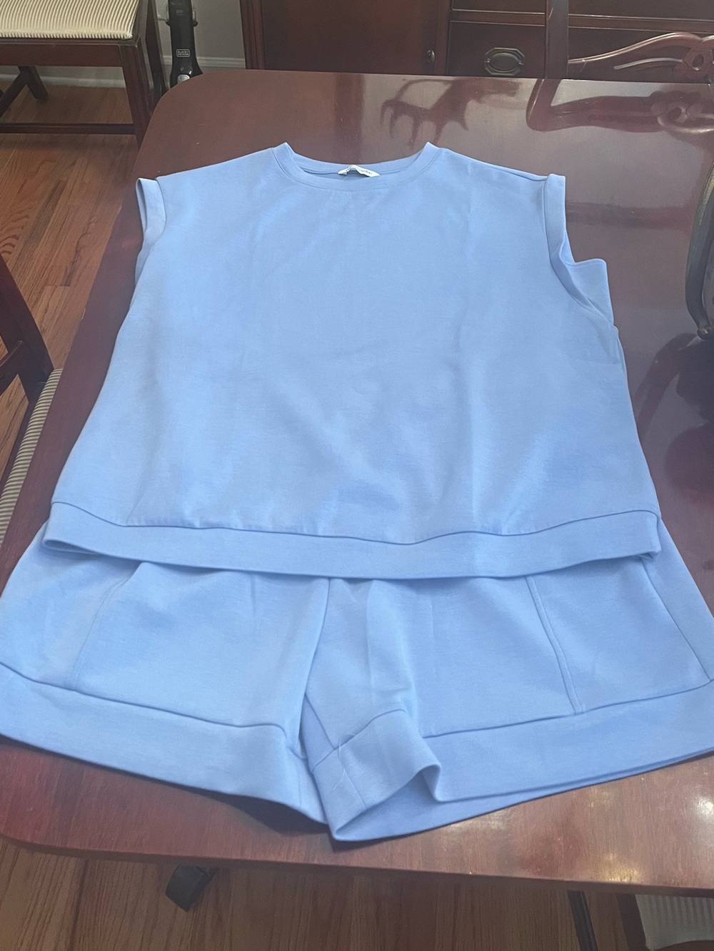 Women's Light Blue Sleeveless Top and Skort Set